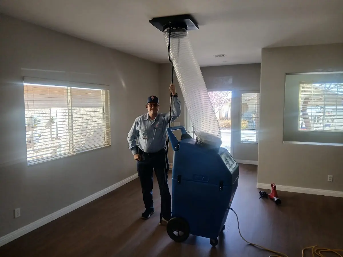 Professional Dryer Vent Cleaning work inside a Delta home